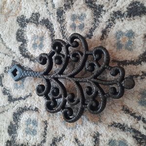John Wright cast iron trivet.